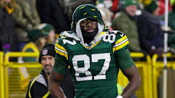 Green Bay Packers wide receiver Romeo Doubs (87) leaves the field after getting injured on a pass interference play commited by San Francisco 49ers cornerback Renardo Green (0) in the third quarter during their football game Sunday, November 24, 2024, at Lambeau Field in Green Bay, Wisconsin.
