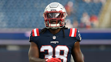 Aug 11, 2022; Foxborough, Massachusetts, USA; New England Patriots running back Rhamondre Stevenson (38) warms up  warms up before a preseason game against the New York Giants at Gillette Stadium. Mandatory Credit: Eric Canha-Imagn Images