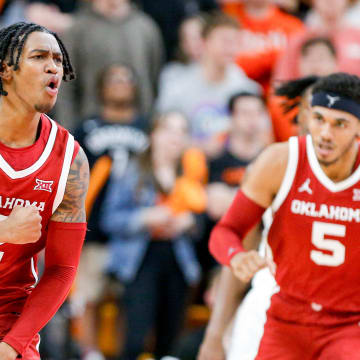 Oklahoma guard Javian McCollum (2) celebrates scoring in the second half during an NCAA basketball game between Oklahoma and Oklahoma State in Stillwater, Okla., on Saturday, Feb. 24, 2024.