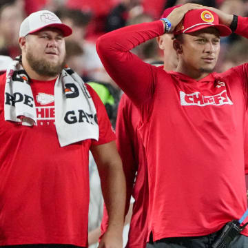 Aug 22, 2024; Kansas City, Missouri, USA; Kansas City Chiefs center Creed Humphrey (52) and quarterback Patrick Mahomes (15) react to play on the sidelines against the Chicago Bears during the game at GEHA Field at Arrowhead Stadium. Mandatory Credit: Denny Medley-USA TODAY Sports