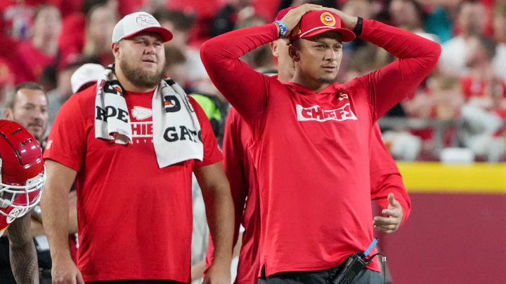 Aug 22, 2024; Kansas City, Missouri, USA; Kansas City Chiefs center Creed Humphrey (52) and quarterback Patrick Mahomes (15) react to play on the sidelines against the Chicago Bears during the game at GEHA Field at Arrowhead Stadium. Mandatory Credit: Denny Medley-USA TODAY Sports