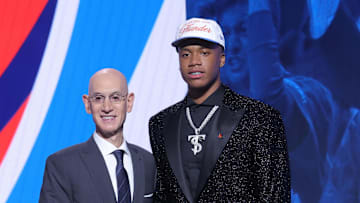 Jun 25, 2025; Brooklyn, NY, USA;  Thomas Sorber stands with NBA commissioner Adam Silver after being selected as the 15th pick by the Oklahoma City Thunder in the first round of the 2025 NBA Draft at Barclays Center. Mandatory Credit: Brad Penner-Imagn Images