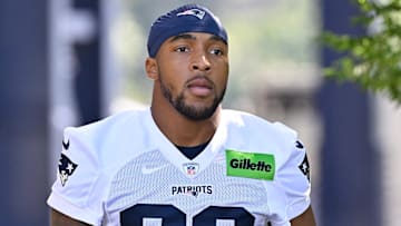 Jul 23, 2025; Foxborough, MA, USA; New England Patriots running back TreVeyon Henderson (32) walks to the practice field for training camp at Gillette Stadium. Mandatory Credit: Eric Canha-Imagn Images