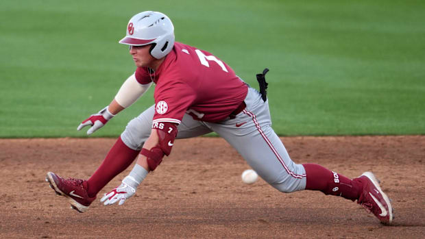 Oklahoma infielder Jaxon Willits (7) slides to second during a college Bedlam baseball game.