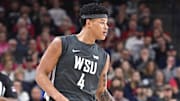 Jan 11, 2025; Spokane, Washington, USA; Washington State Cougars forward LeJuan Watts (4) controls the ball against the Gonzaga Bulldogs in the first half at McCarthey Athletic Center. Mandatory Credit: James Snook-Imagn Images