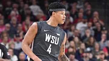Jan 11, 2025; Spokane, Washington, USA; Washington State Cougars forward LeJuan Watts (4) controls the ball against the Gonzaga Bulldogs in the first half at McCarthey Athletic Center. Mandatory Credit: James Snook-Imagn Images