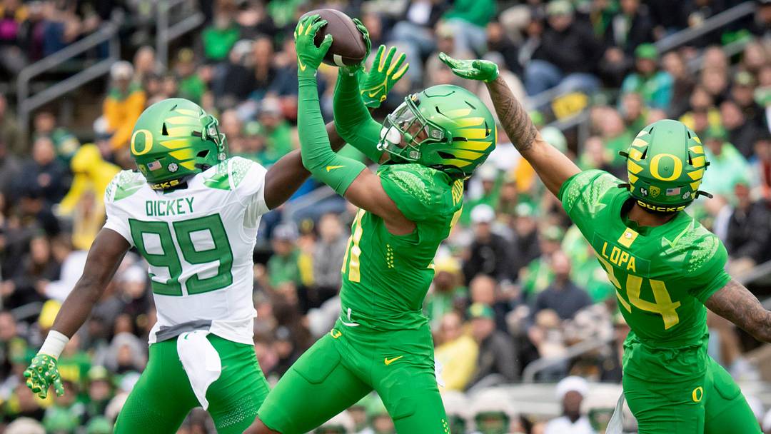 Oregon Green Team defensive back Dakoda Fields intercepts a pass indended for wide receiver Jurrion Dickey during the Oregon Ducks’ Spring Game Saturday, April 27. 2024 at Autzen Stadium in Eugene, Ore.
