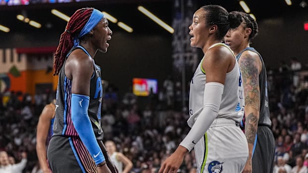 Rhyne Howard and Napheesa Collier exchange words