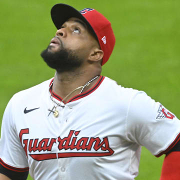 May 13, 2025; Cleveland, Ohio, USA; Cleveland Guardians first baseman Carlos Santana (41) looks for a foul ball in the sixth inning against the Milwaukee Brewers at Progressive Field. Mandatory Credit: David Richard-Imagn Images