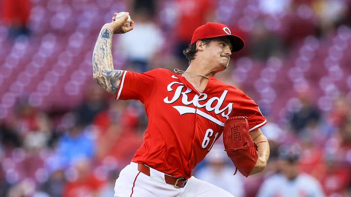 Cincinnati Reds starting pitcher Chase Petty (61) pitches