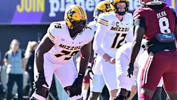Missouri Tigers offensive lineman Armand Membou (79)