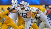 Oct 19, 2025; Inglewood, California, USA; Indianapolis Colts offensive tackle Braden Smith (72) blocks Los Angeles Chargers defensive tackle Justin Eboigbe (92) during the second half at SoFi Stadium. 