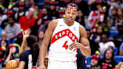 Nov 27, 2024; New Orleans, Louisiana, USA;  Toronto Raptors forward Scottie Barnes (4) reacts to being struck in the face on a play by the New Orleans Pelicans during the first half at Smoothie King Center. Mandatory Credit: Stephen Lew-Imagn Images