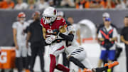 Aug 12, 2022; Cincinnati, Ohio, USA; Arizona Cardinals wide receiver Andy Isabella (17) runs with the ball against Cincinnati Bengals cornerback Allan George (42) in the second half at Paycor Stadium. Mandatory Credit: Katie Stratman-Imagn Images
