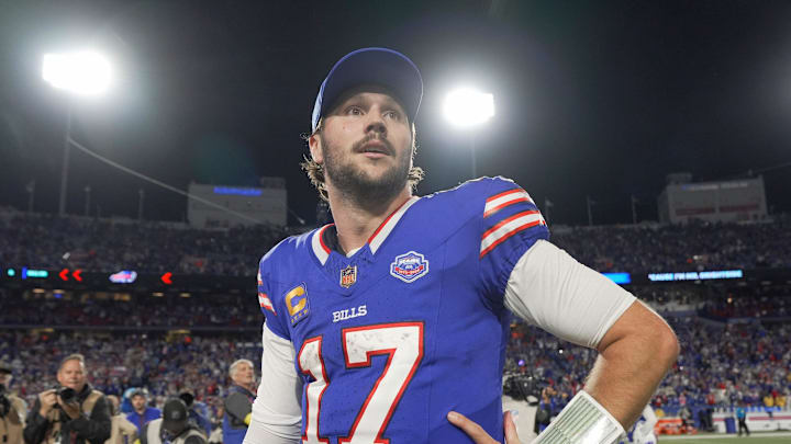 Buffalo Bills quarterback Josh Allen looks around the stadium after the game and their win against the Baltimore Ravens at Highmark Stadium in Orchard Park