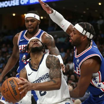 Apr 6, 2024; Memphis, Tennessee, USA; Memphis Grizzlies guard Zavier Simpson (2) handles the ball as Philadelphia 76ers guard Buddy Hield (17) defends during the second half at FedExForum. Mandatory Credit: Petre Thomas-USA TODAY Sports