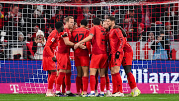 Bayern Munich players celebrating Jamal Musiala's goal against RB Leipzig on matchday 15 of the Bundesliga.