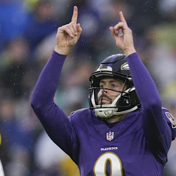 Dec 10, 2023; Baltimore, Maryland, USA;  Baltimore Ravens place kicker Justin Tucker (9) celebrates his field goal during the second half against the Los Angeles Rams at M&T Bank Stadium. Mandatory Credit: Jessica Rapfogel-Imagn Images