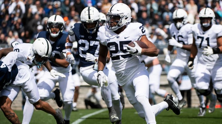 Penn State running back Quinton Martin Jr. carries the ball for a touchdown during the Blue-White Game at Beaver Stadium.