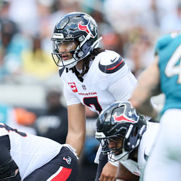 Sep 21, 2025; Jacksonville, Florida, USA; Houston Texans quarterback C.J. Stroud (7) looks on before the start of a play against the Jacksonville Jaguars in the first quarter at EverBank Stadium. Mandatory Credit: Morgan Tencza-Imagn Images