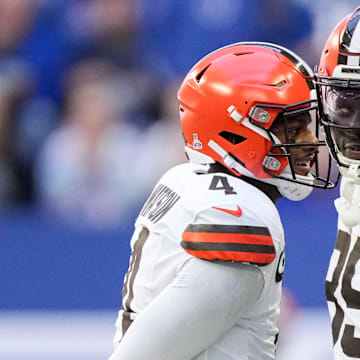 Cleveland Browns quarterback Deshaun Watson (4) and Cleveland Browns tight end David Njoku (85) react after a touchdown Sunday, Oct. 22, 2023, during a game against the Indianapolis Colts at Lucas Oil Stadium in Indianapolis.