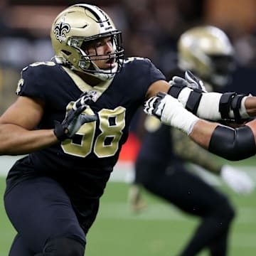 Nov 7, 2021; New Orleans, Louisiana, USA; New Orleans Saints defensive end Payton Turner (98) is blocked by Atlanta Falcons offensive tackle Jake Matthews (70) during the second quarter at the Caesars Superdome. 