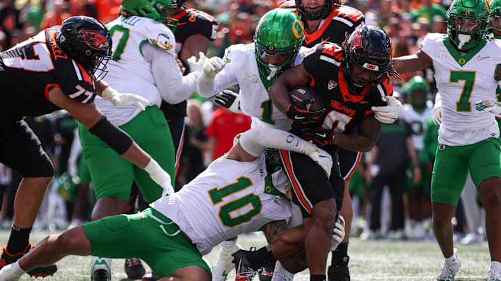 Oregon State Beavers running back Anthony Hankerson (0) runs the ball to score a touchdown in the first half of the annual rivalry game against the Oregon Ducks on Saturday, Sept. 14, 2024 at Reser Stadium in Corvallis, Ore.