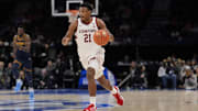 Mar 12, 2025; Charlotte, NC, USA;  Stanford Cardinal guard Jaylen Blakes (21) brings the ball up court against the California Golden Bears during the second half at Spectrum Center. Mandatory Credit: Jim Dedmon-Imagn Images