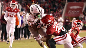 Mississippi State Bulldogs wide receiver Anthony Evans III (3) scores a touchdown during the fourth quarter against the Arkansas Razorbacks at Donald W. Reynolds Razorback Stadium. Bulldogs won 38-35.
