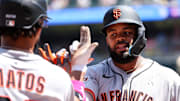 May 11, 2025; Minneapolis, Minnesota, USA; San Francisco Giants left fielder Heliot Ramos (17) celebrates his two run home run against the Minnesota Twins during the third inning at Target Field. 