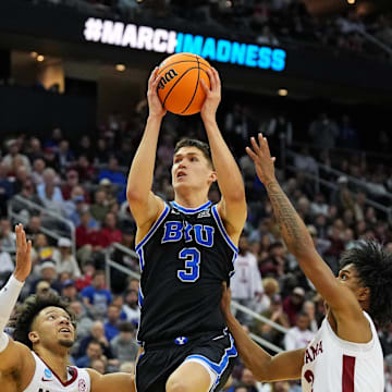 Mar 27, 2025; Newark, NJ, USA; Brigham Young Cougars guard Egor Demin (3) drives to the basket against Alabama Crimson Tide guard Mark Sears (1) during the second half during an East Regional semifinal of the 2025 NCAA tournament at Prudential Center. Mandatory Credit: Robert Deutsch-Imagn Images