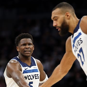 Anthony Edwards and Rudy Gobert during a regular season game.