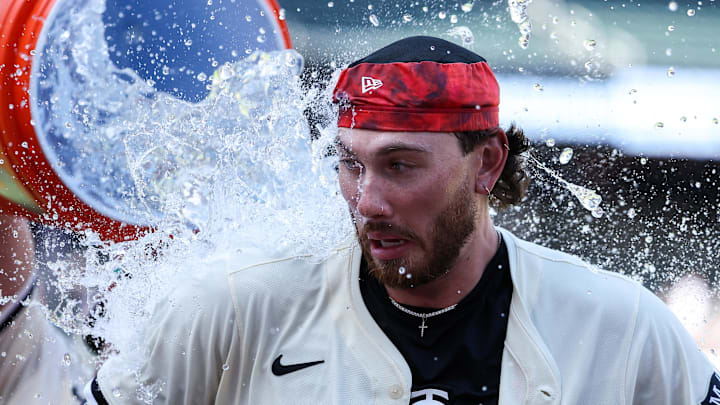 May 11, 2025; Minneapolis, Minnesota, USA; Minnesota Twins first baseman Ty France (13) dumps a bucket of water on outfielder DaShawn Keirsey Jr. (21) after his walk-off single against the San Francisco Giants after the game at Target Field. Mandatory Credit: Matt Krohn-Imagn Images May 11, 2025; Minneapolis, Minnesota, USA; Minnesota Twins first baseman Ty France (13) dumps a bucket of water on outfielder DaShawn Keirsey Jr. (21) after his walk-off single against the San Francisco Giants after the game at Target Field. Mandatory Credit: Matt Krohn-Imagn Images