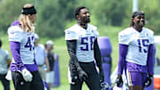 Minnesota Vikings linebackers Andrew Van Ginkel, Jonathan Greenard and Dallas Turner talk during NFL offseason minicamp
