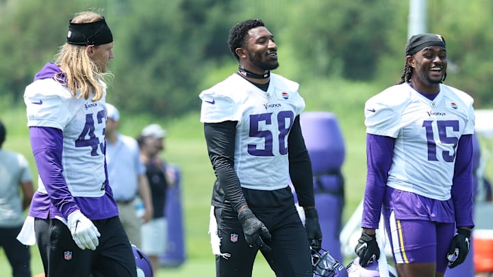 Minnesota Vikings linebackers Andrew Van Ginkel, Jonathan Greenard and Dallas Turner talk during NFL offseason minicamp