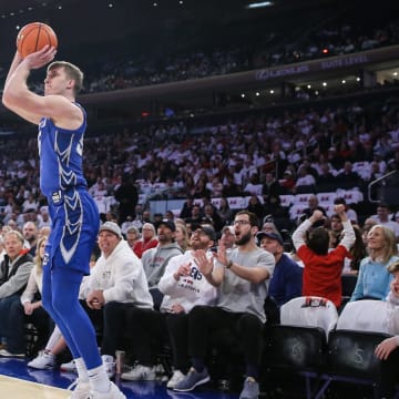 Feb 25, 2024; New York, New York, USA;  Creighton Bluejays guard Baylor Scheierman (55) takes a three-point shot in the first half against the St. John's Red Storm at Madison Square Garden. Mandatory Credit: Wendell Cruz-USA TODAY Sports