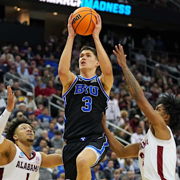 Mar 27, 2025; Newark, NJ, USA; Brigham Young Cougars guard Egor Demin (3) drives to the basket against Alabama Crimson Tide guard Mark Sears (1) during the second half during an East Regional semifinal of the 2025 NCAA tournament at Prudential Center. Mandatory Credit: Robert Deutsch-Imagn Images