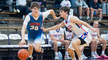 Indiana Junior All-Star Braylon Mullins (30) makes his way to the basket around Kentucky Junior All-Star Zander Carter (7) during their game on Sunday, June 2, 2024 in Scottsburg, Ind. at Charles E. Meyer Gymnasium for the first game of the Indiana vs Kentucky All-Stars basketball week.