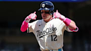 May 11, 2025; Minneapolis, Minnesota, USA; Minnesota Twins left fielder Harrison Bader (12) celebrates his single against the San Francisco Giants during the third inning at Target Field.