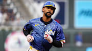 Apr 25, 2025; Minneapolis, Minnesota, USA; Minnesota Twins center fielder Byron Buxton (25) rounds the bases after hitting a solo home run against the Los Angeles Angels during the third inning at Target Field.