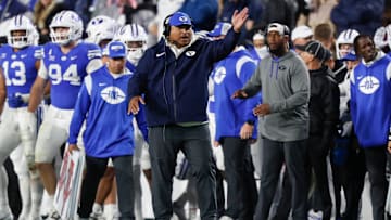 Head coach Kalani Sitake of the Brigham Young Cougars reacts to a call agaisnt the Oklahoma State Cowboys during the second half of their game at LaVell Edwards Stadium on October 18, 2024 in Provo, Utah.