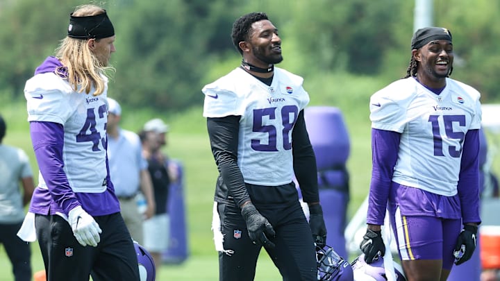 Minnesota Vikings linebacker Andrew Van Ginkel (43), linebacker Jonathan Greenard (58) and linebacker Dallas Turner (15)