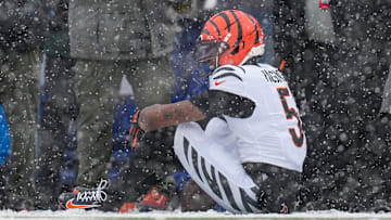 Cincinnati Bengals wide receiver Tee Higgins (5) waits for trainers after hitting his head on the ground on a catch in the second quarter of the NFL Week 14 game between the Buffalo Bills and the Cincinnati Bengals at Highmark Stadium in Orchard Park, N.Y., on Sunday, Dec. 7, 2025.