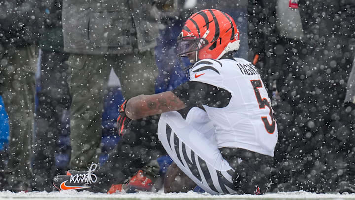 Cincinnati Bengals wide receiver Tee Higgins (5) waits for trainers after hitting his head on the ground on a catch in the second quarter of the NFL Week 14 game between the Buffalo Bills and the Cincinnati Bengals at Highmark Stadium in Orchard Park, N.Y., on Sunday, Dec. 7, 2025.