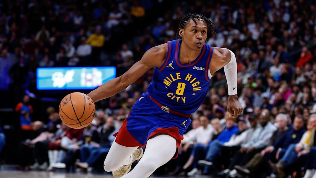 Feb 1, 2026; Denver, Colorado, USA; Denver Nuggets guard Peyton Watson (8) controls the ball in the third quarter against the Oklahoma City Thunder at Ball Arena. Mandatory Credit: Isaiah J. Downing-Imagn Images