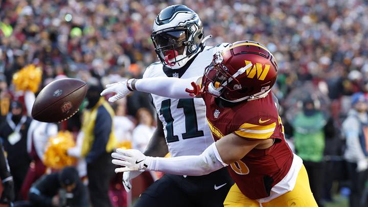 Dec 22, 2024; Landover, Maryland, USA; Washington Commanders cornerback Marshon Lattimore (23) defends a pass intended for Philadelphia Eagles wide receiver A.J. Brown (11) during the first quarter at Northwest Stadium.