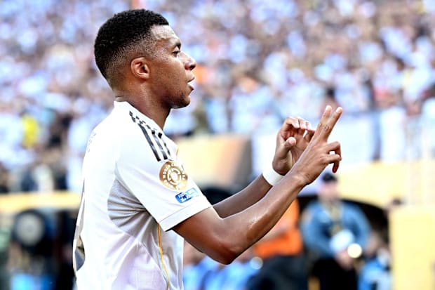 Kylian Mbappé celebrating for Real Madrid.