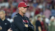 Nov 8, 2025; Tuscaloosa, Alabama, USA; Alabama Crimson Tide head coach Kalen Deboer looks on during warmups prior to the game against the Louisiana State Tigers at Saban Field at Bryant-Denny Stadium. 