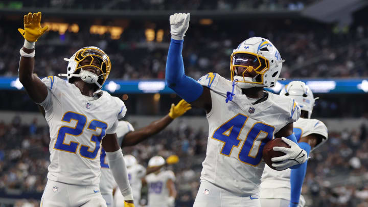 Aug 24, 2024; Arlington, Texas, USA; Los Angeles Chargers cornerback Robert Kennedy (40) reacts after making an interception in the fourth quarter against the Dallas Cowboys at AT&T Stadium. Mandatory Credit: Tim Heitman-USA TODAY Sports