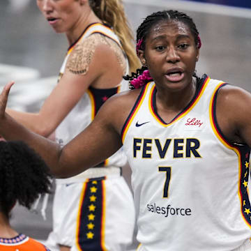 Aug 28, 2024; Indianapolis, Indiana, USA; Indiana Fever forward Aliyah Boston (7) reacts to a call during a game between the Indiana Fever and the Connecticut Sun at Gainbridge Fieldhouse. Mandatory Credit: Grace Smith-INDIANAPOLIS STAR-Imagn Images